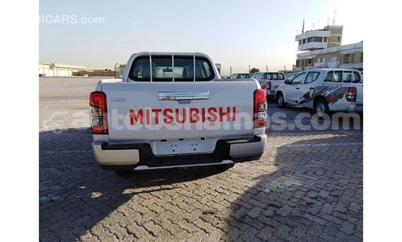 Buy Import Mitsubishi L200 White Car in Import - Dubai in Abaco Buy Import Mitsubishi L200 White Car in Import - Dubai in Abaco