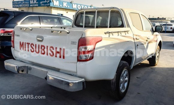 Buy Import Mitsubishi L200 White Car in Import - Dubai in Abaco Buy Import Mitsubishi L200 White Car in Import - Dubai in Abaco