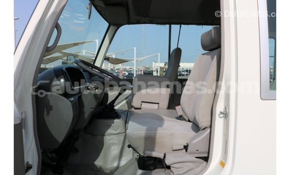 Buy Import Toyota Coaster White Car in Import - Dubai in Abaco